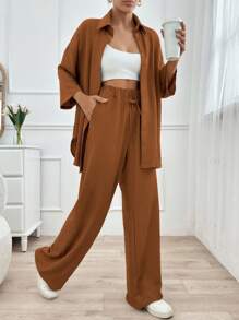 Conjunto de camisa y pantalones de unicolor informal para el transporte