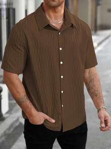 Manfinity Homme Camisa casual de manga corta de un solo pecho en unicolor para hombres de talla grande de verano