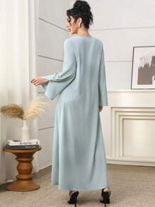 Yasmyna Kaftan y Jalabiya en color verde menta con decoración de lazo con textura floral hecho a mano para damas