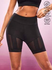 SHEIN Sports شورت رياضي للنساء بخصر مطاطي مع إدراج شفاف في اللون الأحادي - الأسود - مشاهدة 1
