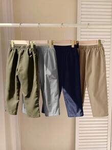 SHEIN Quần dài rộng rãi thoải mái phong cách học viện thường ngày LMoss Kids 4 món/bộ cho bé trai mùa thu, màu trơn, thiết kế nút và túi, rộng rãi, thoải mái, đa năng cho các hoạt động ngoài trời, kỳ nghỉ, tiệc tùng, trường học, mặc ở nhà, thích hợp cho mùa xuân và mùa hè - Nhiều màu - Xem 3