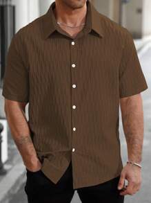 Manfinity Homme Camisa casual de manga corta de un solo pecho en unicolor para hombres de talla grande de verano
