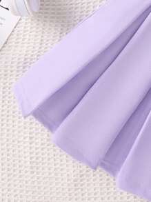 مجموعة 3 قطع للبنات (4-7 سنوات) أنيقة وجذابة: لباس علوي رياضي بلون المشمش مع تأثير دافئ ومتنوع ، فوق ملابس علوية أسود بسيط مطبوع عليه حرف LOSANGELES ، تنورة منسوجة بتفاصيل أنيقة وجميلة. يمكن ارتداء المجموعة بشكل منفصل أو مزجها لمظاهر مختلفة ، مناسبة للربيع والخريف والشتاء