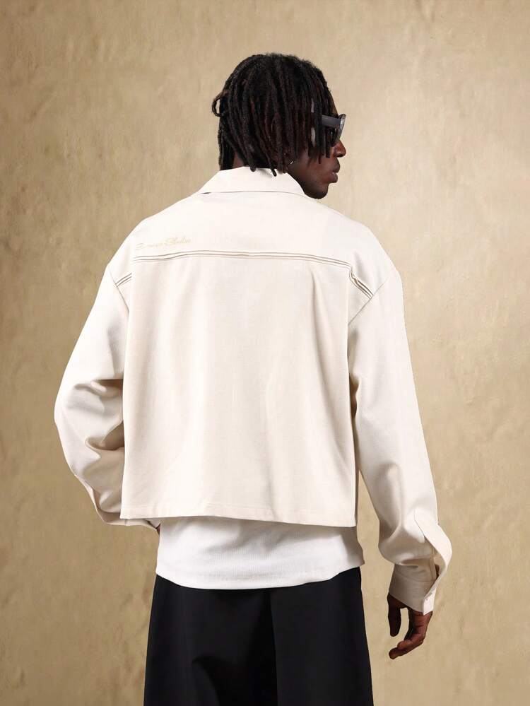 コントラストステッチとボタンフロントのリネンクロップドジャケット