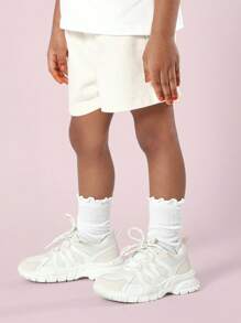 SUMWON Shorts de tela de sarga con bolsillo con forma de corazón, estilo colegial, para vacaciones de verano, longitud regular, shorts casuales para la escuela, colección para niñas jóvenes - Blanco - Ver 4