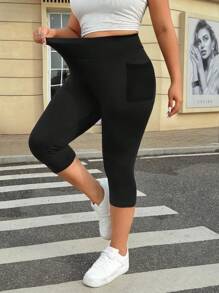 SHEIN EZwear Mallas capri de talla grande de color liso con bolsillo lateral y cintura alta