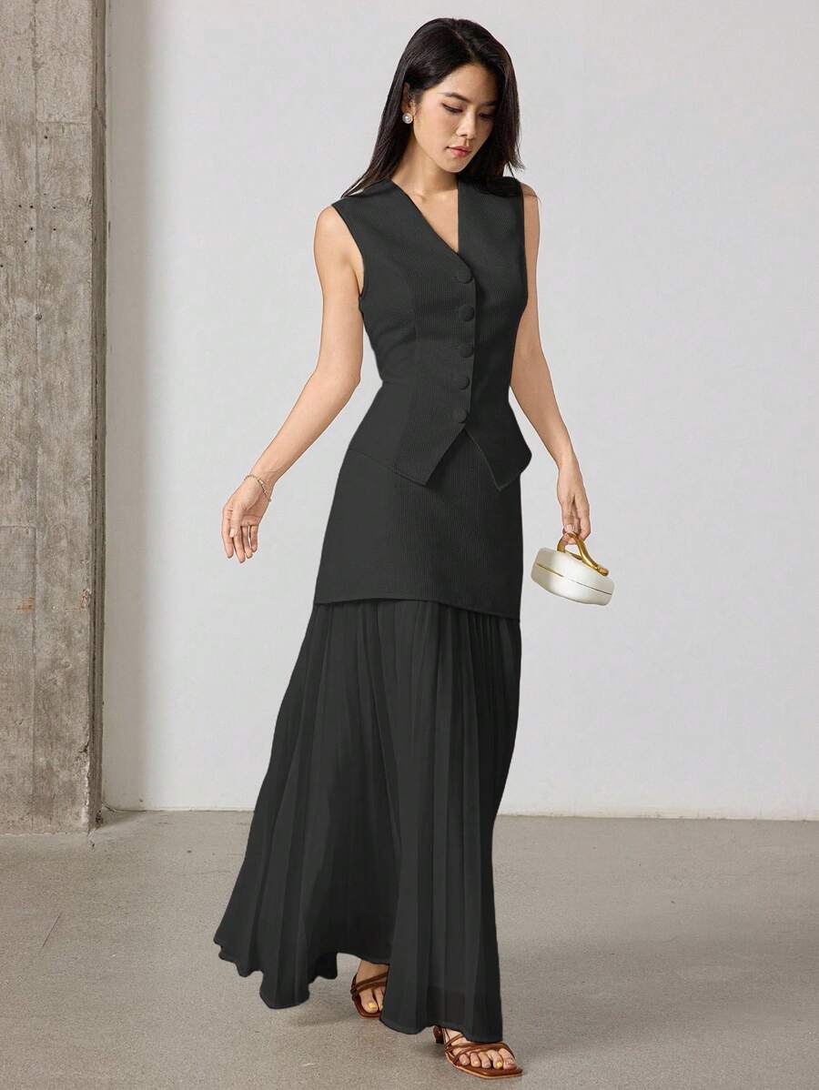 Heiryn Bộ 2 món áo vest trơn màu thanh lịch và chân váy xếp ly cho nữ - màu đen - Xem 1