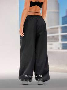 GLOWMODE Studio Flow Jogginghose mit gewebten Taschen, Kordelzug in der Taille, verstellbare Beinöffnung, reflektierend, weite, oversized Form, für Low-Impact Tanz, Yoga, Pilates, Barre, Studio und alltägliche Freizeitgestaltung