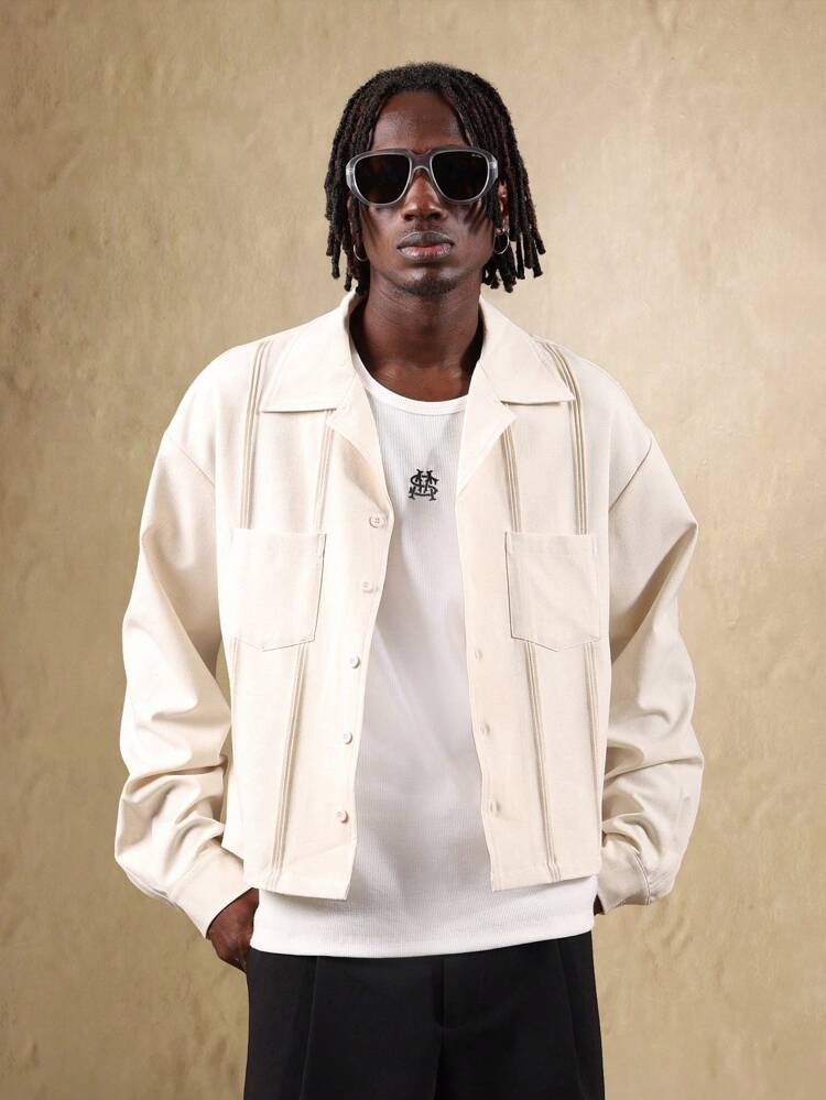 コントラストステッチとボタンフロントのリネンクロップドジャケット