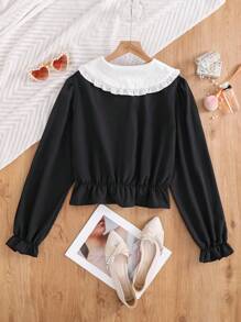 Camisa negra para adolescentes con cuello de tela de contraste, mangas abullonadas y plisado en el bajo