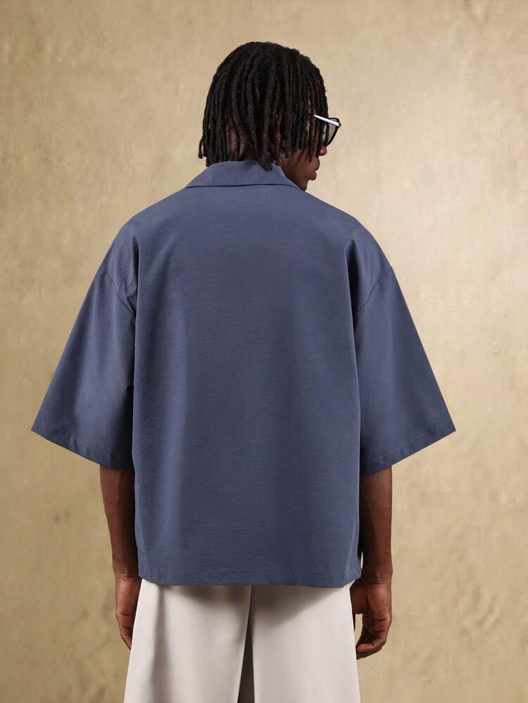 Camicia da resort squadrata con stampa tropicale e bottoni sul davanti