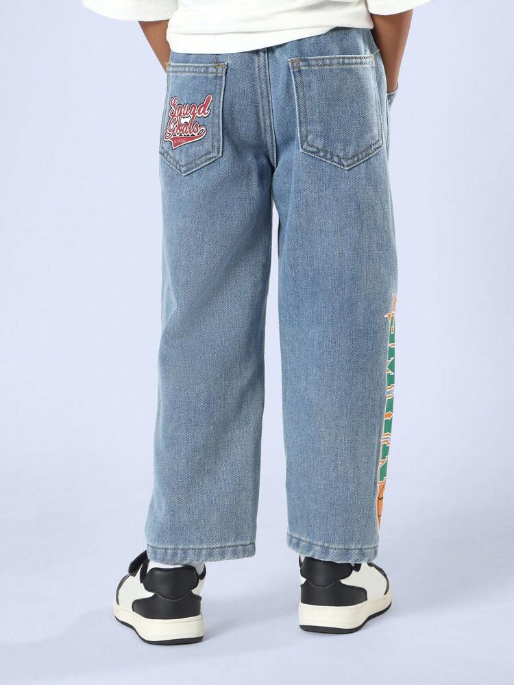 Printed Barrel Jeans With Sports Theme Patches And Appliques