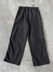 Manfinity EMRG Pantaloni casual da uomo con stampa a strisce laterali color contrasto