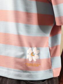 SUMWON T-shirt surdimensionné rayé avec grande impression de marguerite sur le dos. Tenue décontractée d'été, de plage, de vacances, de rue, de printemps, de fête. Top essentiel unisexe - Multicolore - Voir 5