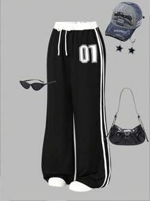 Sparklyn 休闲街头嘻哈风格短款字母印花运动裤，适合少女户外、街头摄影、校园穿着