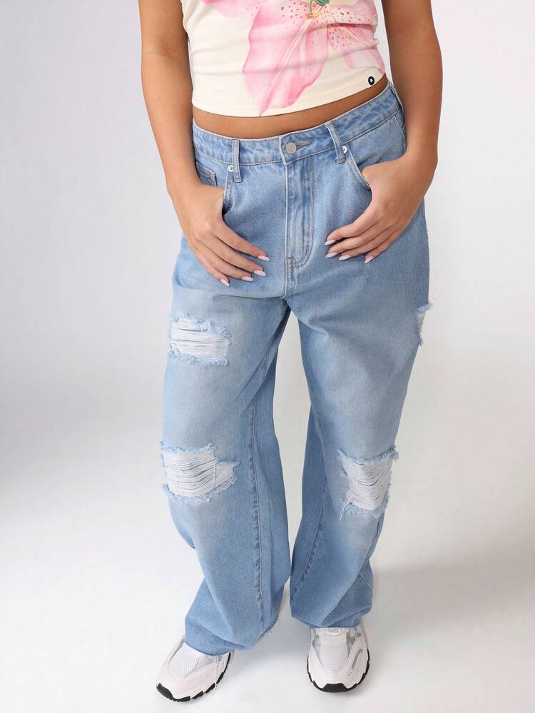 Distressed Wide Leg Denim Jeans With Ripped Details