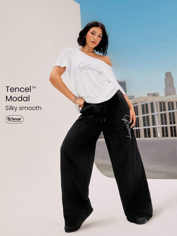 GLOWMODE TENCEL™ Modal Shimmy And Shake Lightweight Silky Smooth Loose Reflective Logo Off-Shoulder Short Sleeve Tee Dancing Daily Casual Wear