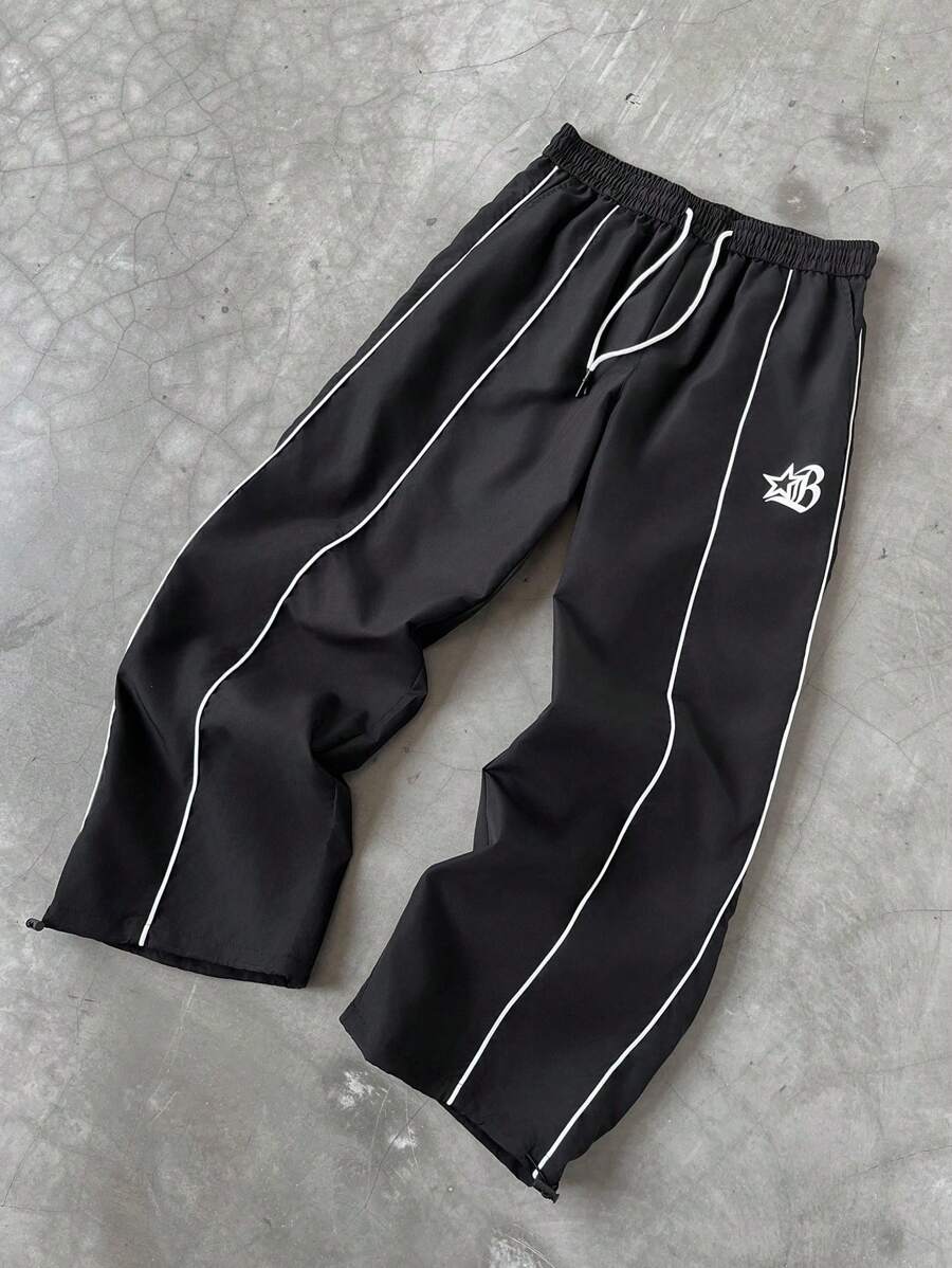 Manfinity EMRG Pantaloni casual da uomo con stampa a strisce laterali color contrasto