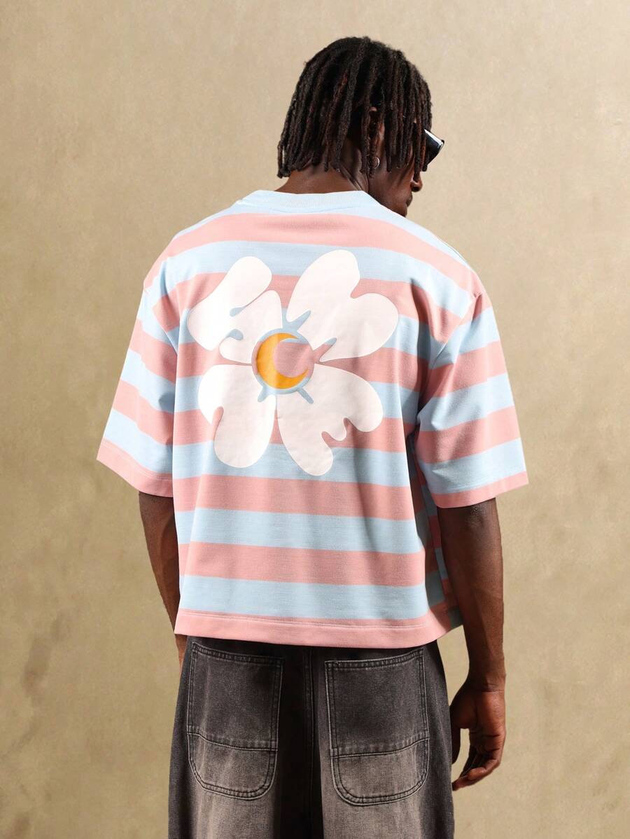 SUMWON T-shirt surdimensionné rayé avec grande impression de marguerite sur le dos. Tenue décontractée d'été, de plage, de vacances, de rue, de printemps, de fête. Top essentiel unisexe - Multicolore - Voir 1