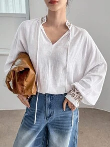DAZY Blusa de mujer de manga larga con bordado floral, estilo bohemio, casual y suelto, para resort, con cuello alto y cordón, ropa casual de trabajo para mujer
