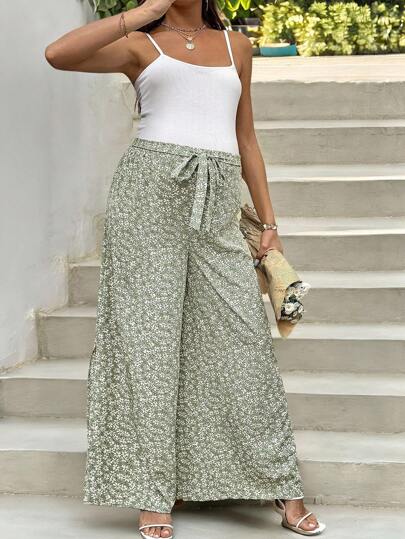 SHEIN Pantalones de maternidad de estilo informal con estampado floral pequeño, cintura con lazo, piernas anchas, sueltos y bajo con abertura