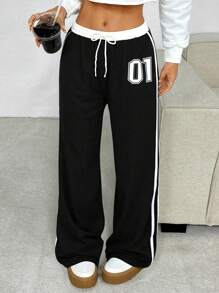 Sparklyn 休闲街头嘻哈风格短款字母印花运动裤，适合少女户外、街头摄影、校园穿着