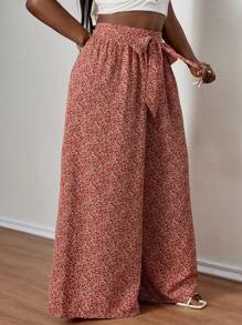SHEIN PETITE CURVE Pantalones anchos casuales de talla grande con impresión todo sobre en color rojo óxido y detalle de retorcido para mujeres