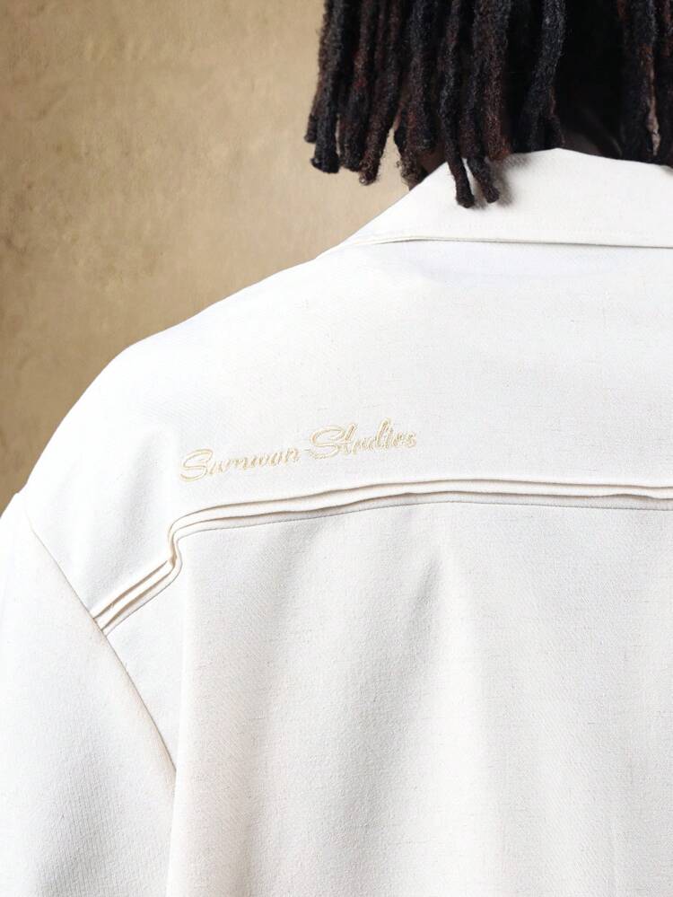 コントラストステッチとボタンフロントのリネンクロップドジャケット