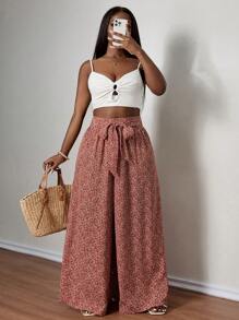 SHEIN PETITE CURVE Pantalones anchos casuales de talla grande con impresión todo sobre en color rojo óxido y detalle de retorcido para mujeres