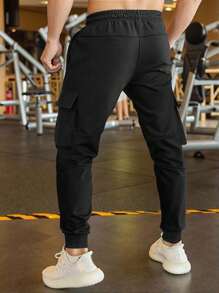 Manfinity Homme Pantalones de chándal negros para hombres, pantalones rectos informales con cordón en la cintura