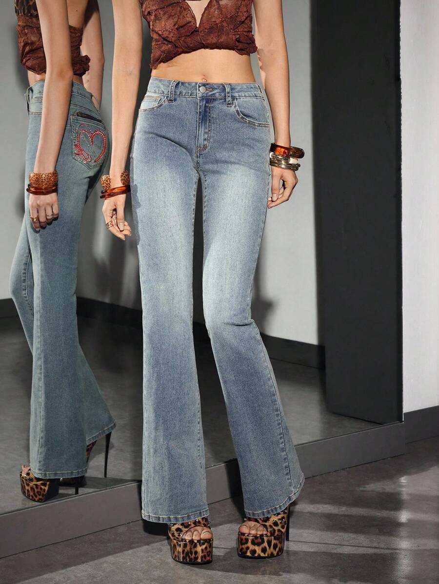 SHEIN Unity Jeans de mezclilla casuales y versátiles con bolsillos acampanados para mujer - Azul - Ver 1