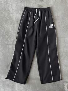 Manfinity EMRG Pantaloni casual da uomo con stampa a strisce laterali color contrasto