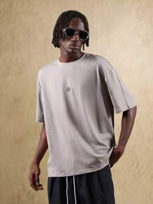 SUMWON Camiseta oversize de algodón de manga corta con estampado grande en la espalda, de estilo urbano y casual, diseño minimalista y moderno, de línea atlética y contemporánea