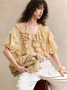 Arave Blusa casual da donna a maniche corte, a tinta unita, con scollo a V, decorata con volant, elegante e romantica