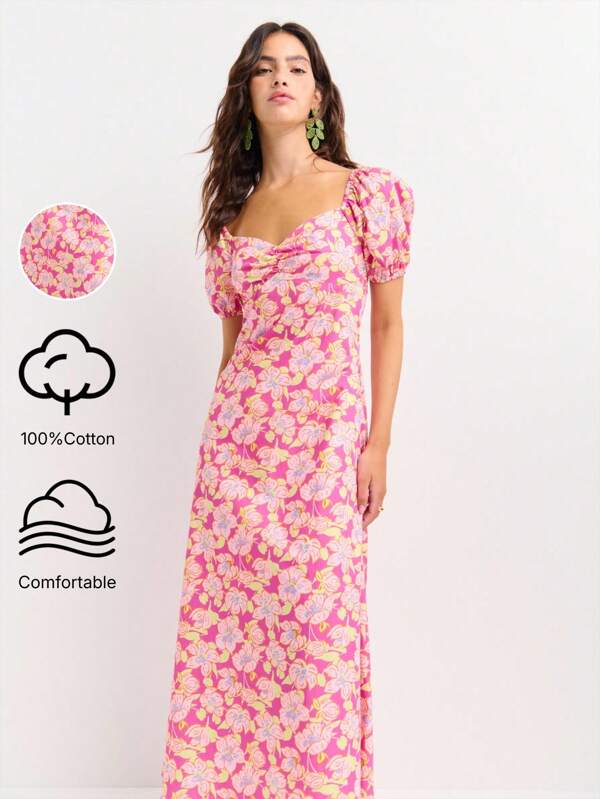 Nöista Floral Puff Sleeve Dress, Ruched Bust, Sweetheart Neckline, Bright Pink Base, Fitted Waist, Flowy Skirt, Vintage Summer Dress, Romantic Style, Midi Length, Soft Fabric, Feminine Silhouette.