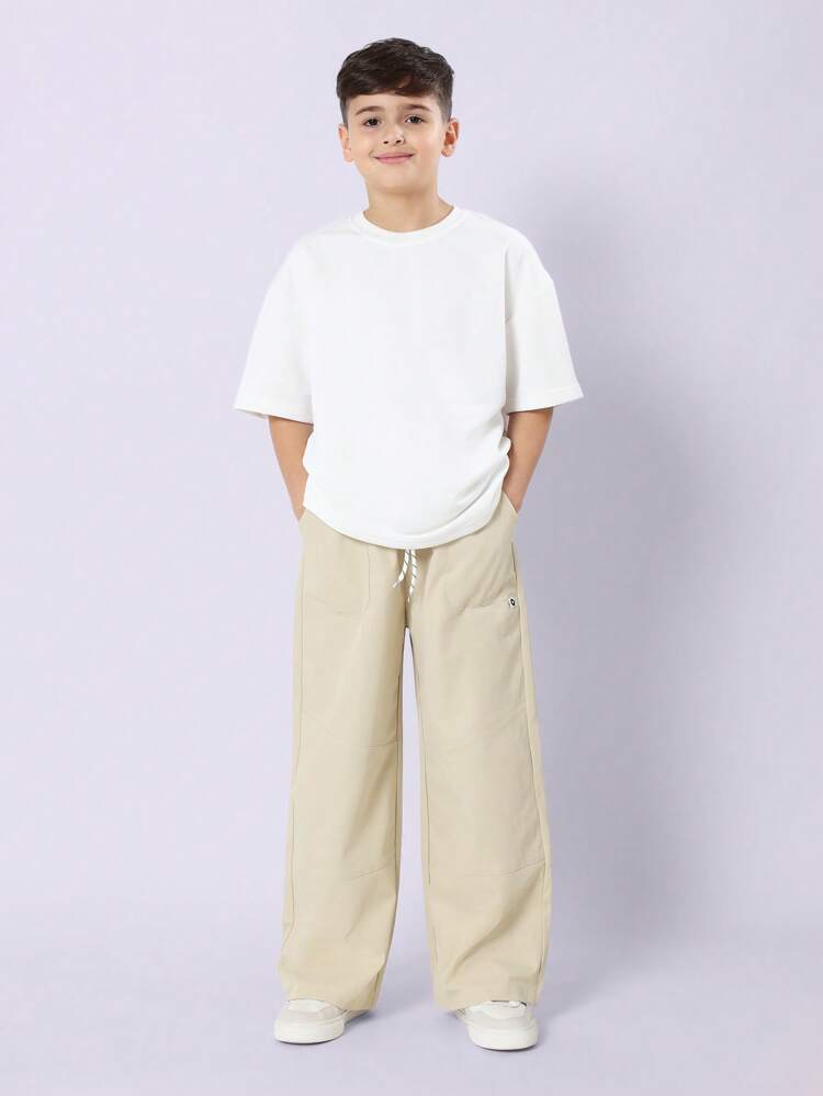 Wide Leg Cargo Pants With Drawstring And Side Pockets