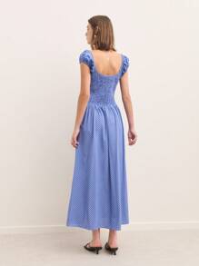 Nöista 这款蓝色长款连衣裙，配有短袖和优雅的领口设计，是秋季女装和返校季的完美之选。其舒适的版型也适合乡村风格的女性穿着，使其成为秋季、休闲日常或特殊场合的百搭之选。 - 藍色 - 查看 2