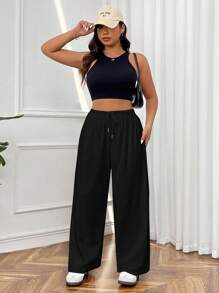 Calça de moletom plus size com amarração frontal e cor sólida simples e casual