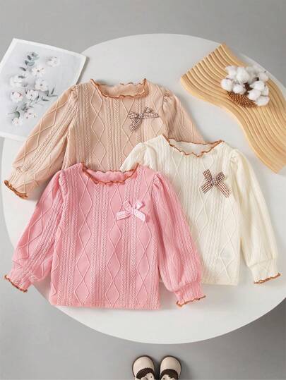 SHEIN 3 件套 Babygirl 套装：粗针织纹理套头衫，颜色柔和，饰有蝴蝶结，外观优雅可爱，适合户外休闲、家居服和派对，秋冬季