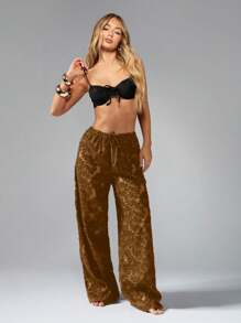 MISSGUIDED Pantalones palazzo de pierna ancha con patrón de terciopelo quemado floral, estilo bohemio, para usar de vacaciones, playa o festival