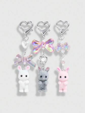Kawaii طقم ثلاث قطع سحر حقيبة أنيق وراق: فيونكة شفافة وردية، خرزة بيضاء وهمية، أرنب لطيف رمادي/أبيض/وردي مرقش للمفاتيح، مناسب للاستخدام اليومي وعطلات النساء