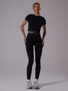 Musera Sport Áo thun trẻ em thể thao ôm sát, viền tương phản, không đường may, kiểu dáng năng động, thích hợp cho tập luyện thể dục thể thao, mùa hè, câu lạc bộ Padel, phòng tập gym và thể dục. - màu đen - Xem 5