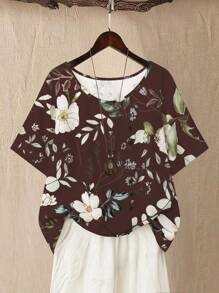 Linhara Blusa informal cómoda con cuello redondo, manga corta y decoración de botones, con estampado floral para mujeres talla plus - Multicolor - Ver 1
