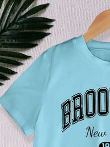 SHEIN Explorewe Teen Girl 2pcs/Set Sports Letter & Graphic Print Loose Round Neck Short Sleeve T-Shirt & Shorts Set, Suitable For Summer Holiday Outfit, School, Campus, College - White - View 3