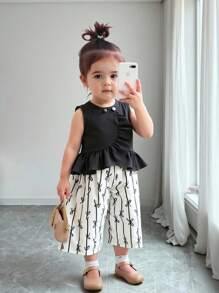 SHEIN Playful Pals 女宝宝蝴蝶结黑白花卉印花时尚优雅套装，韩版风格