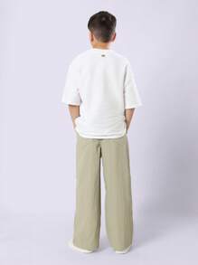 SUMWON 拉上尼龙阔腿裤轻便透气休闲旅行户外探险春秋季下装带侧袋和篮球标志 - 軍綠色 - 查看 5