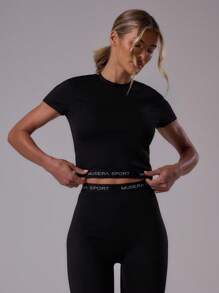 Musera Sport Áo thun trẻ em thể thao ôm sát, viền tương phản, không đường may, kiểu dáng năng động, thích hợp cho tập luyện thể dục thể thao, mùa hè, câu lạc bộ Padel, phòng tập gym và thể dục. - màu đen - Xem 1