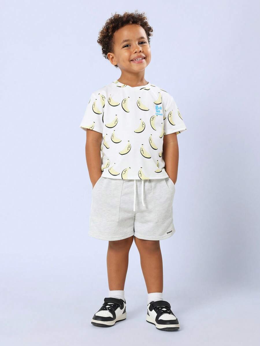 SUMWON Ensemble coordonné d'été pour enfants. T-shirt avec imprimé banane, shorts en jersey avec cordon de serrage. Tenue de plage décontractée pour les vacances. Confort toute la journée, coupe ample
