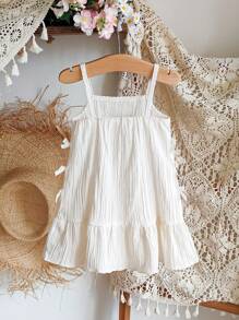 SHEIN Vintaside Kids 1 件装女婴无袖细肩带连衣裙，甜美淑女风格褶皱柔软材质蝴蝶结短款 A 字形荷叶边下摆连衣裙，适合日常、旅行、度假、百搭夏季新品的休闲装 - 杏色 - 查看 2