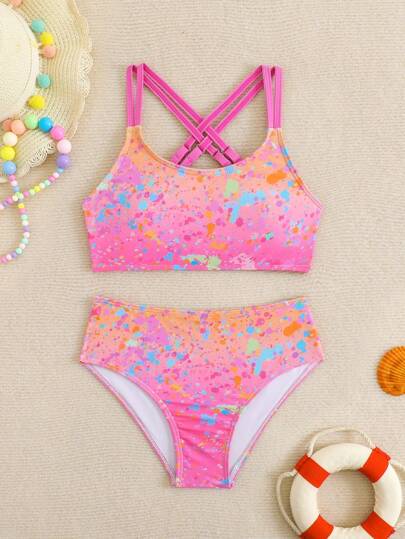 女童两件套泳衣，春夏新品。花卉水彩印花图案，搭配紫蓝撞色，设计优雅。适合8-12岁女童在海滩、游泳、水上乐园穿着。不对称印花比基尼套装，充满Y2K风情